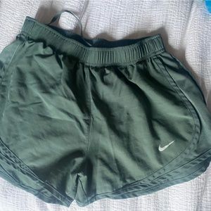 Sage green Nike running shorts. Size small.